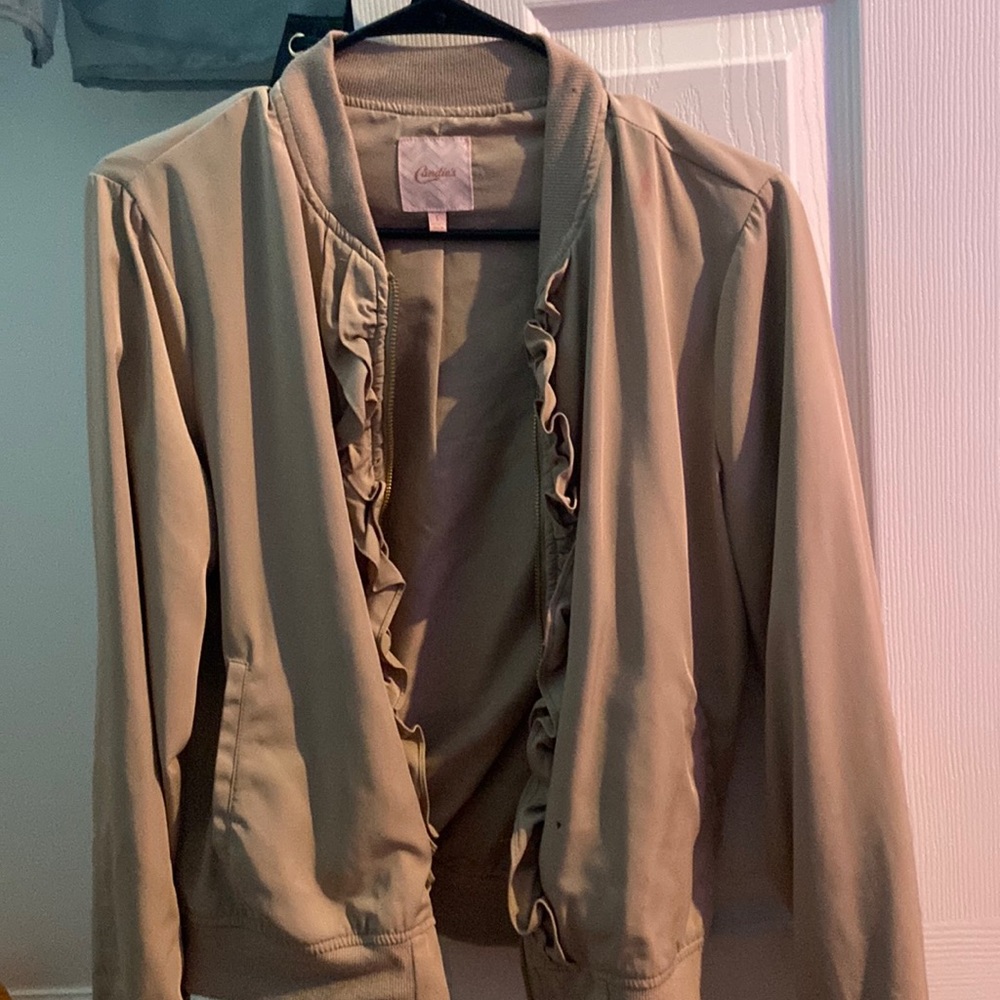 Tan Bomber jacket with flower on back.